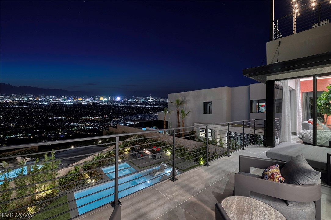 619 Overlook Rim Drive Henderson, NV 89012 - Photo 1 of 29 Strip View Off Primary Bedroom Deck