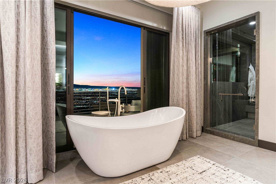 619 Overlook Rim Drive Henderson, NV 89012 - Photo 13 of 29 Primary Suite Bathroom with Strip View