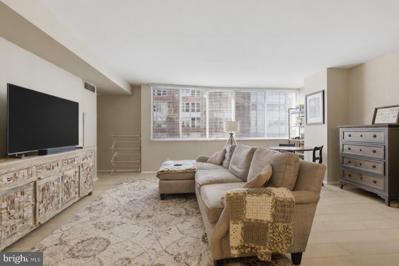 1245 13th Street Northwest, Unit 412 Washington, DC 20005 - Photo 2 of 13 Entry to LR and wall of windows