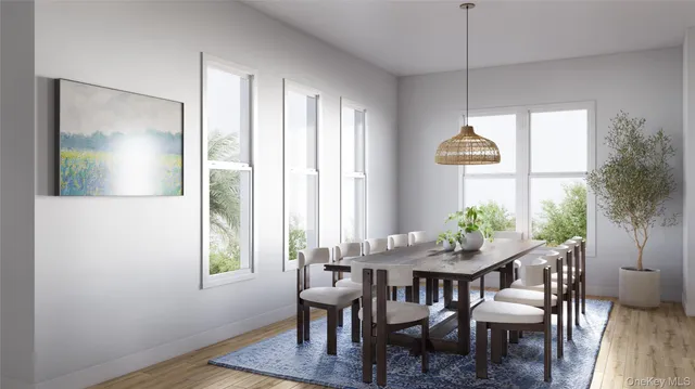 a view of a dining room with furniture window and outside view