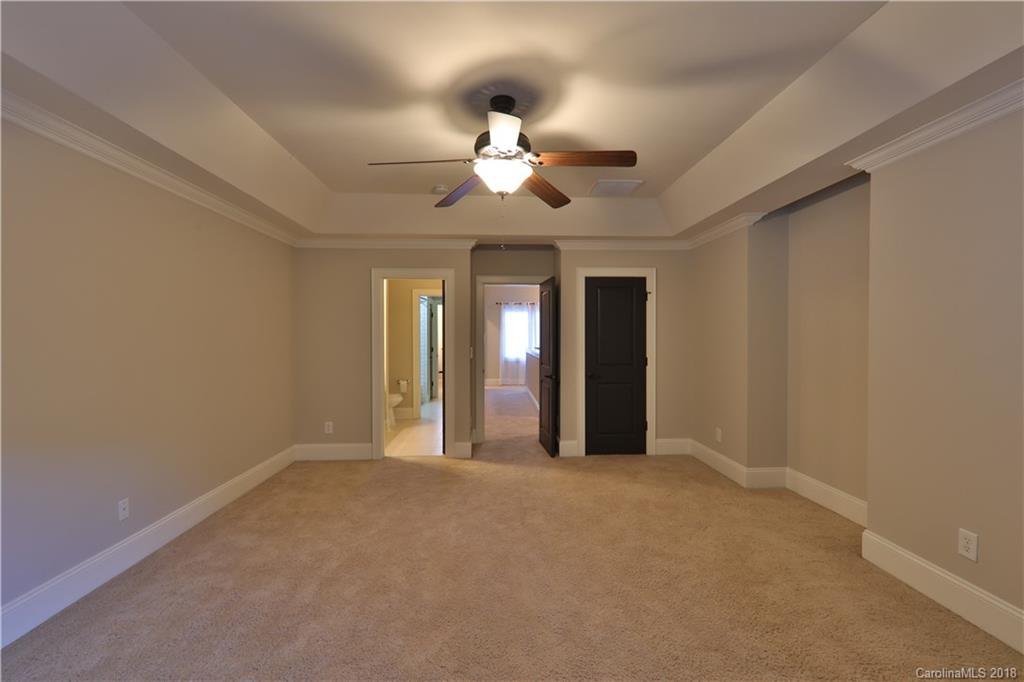 3715 Churchill Road Charlotte, NC 28211 - Photo 11 of 19 a view of an empty room with a window