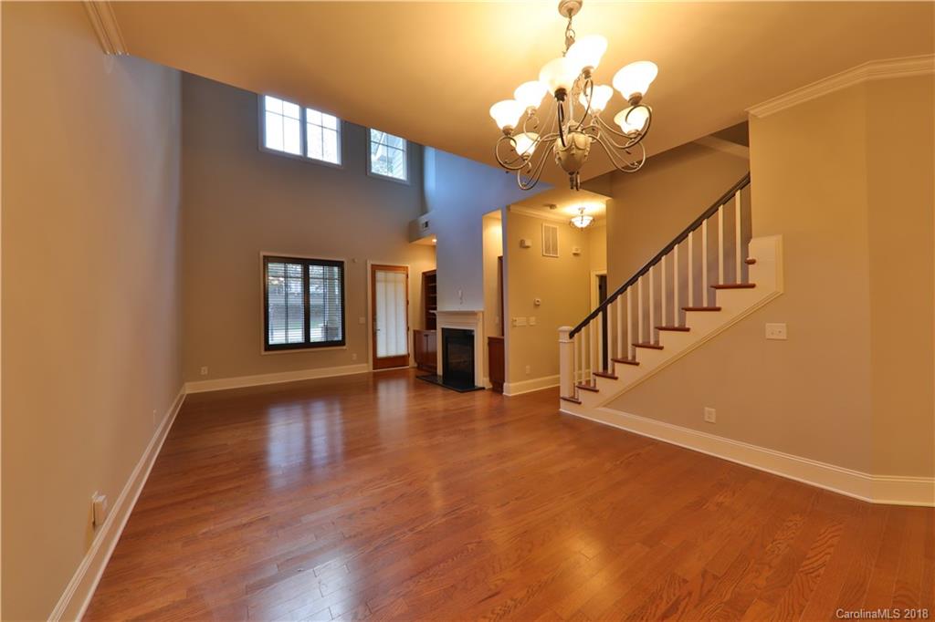 3715 Churchill Road Charlotte, NC 28211 - Photo 3 of 19 a view of a livingroom with wooden floor and a large window