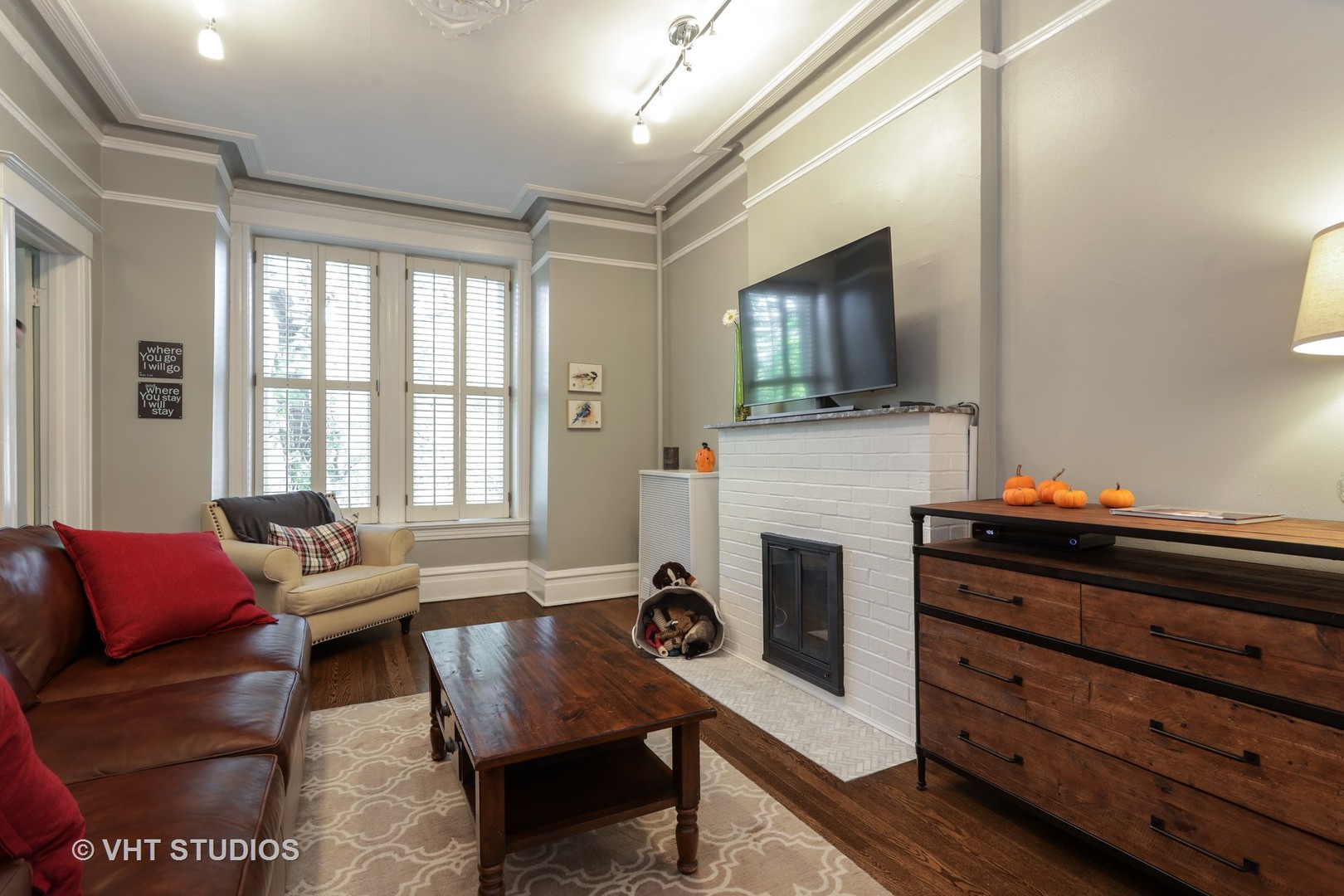 2159 North Seminary Avenue, Unit B Chicago, IL 60614 - Photo 2 of 14 a living room with furniture fireplace and flat screen tv