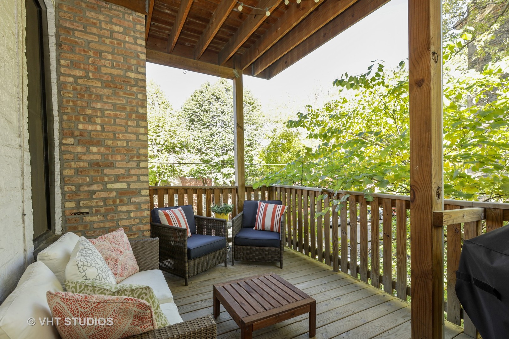 2159 North Seminary Avenue, Unit B Chicago, IL 60614 - Photo 12 of 14 a balcony with furniture and a potted plant