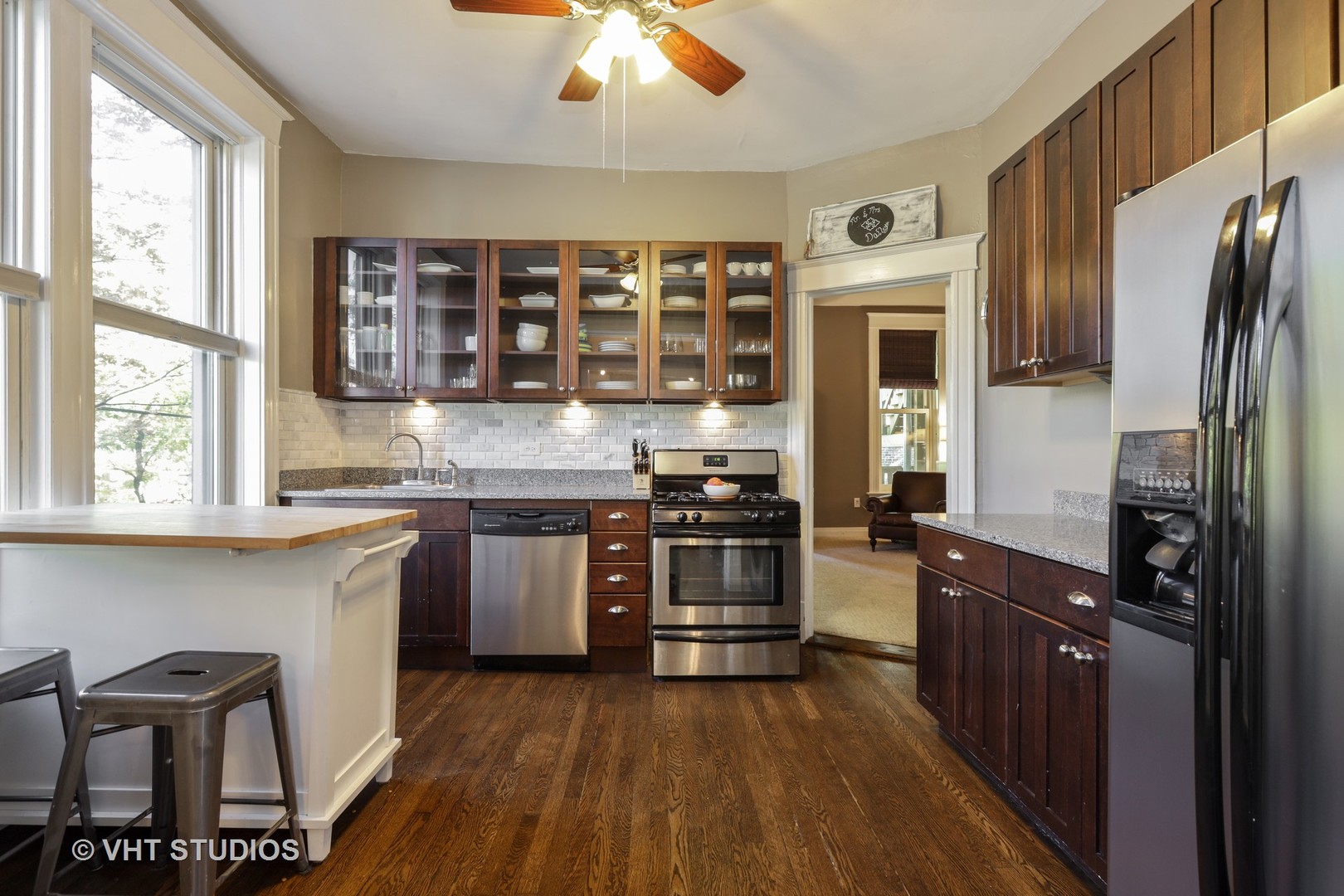 2159 North Seminary Avenue, Unit B Chicago, IL 60614 - Photo 4 of 14 a kitchen with stainless steel appliances granite countertop a stove and a refrigerator