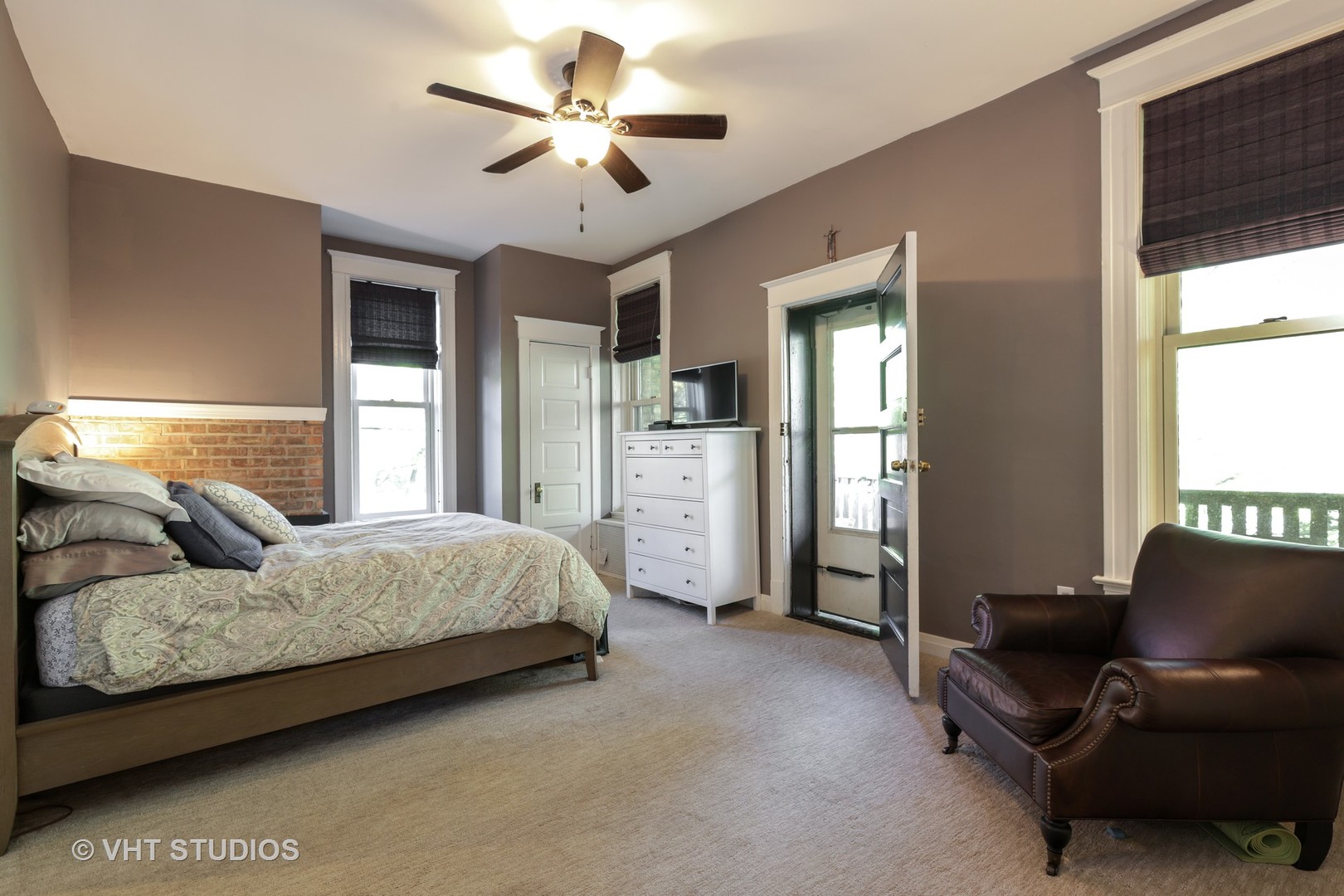 2159 North Seminary Avenue, Unit B Chicago, IL 60614 - Photo 7 of 14 a bedroom with a bed ceiling fan and a window