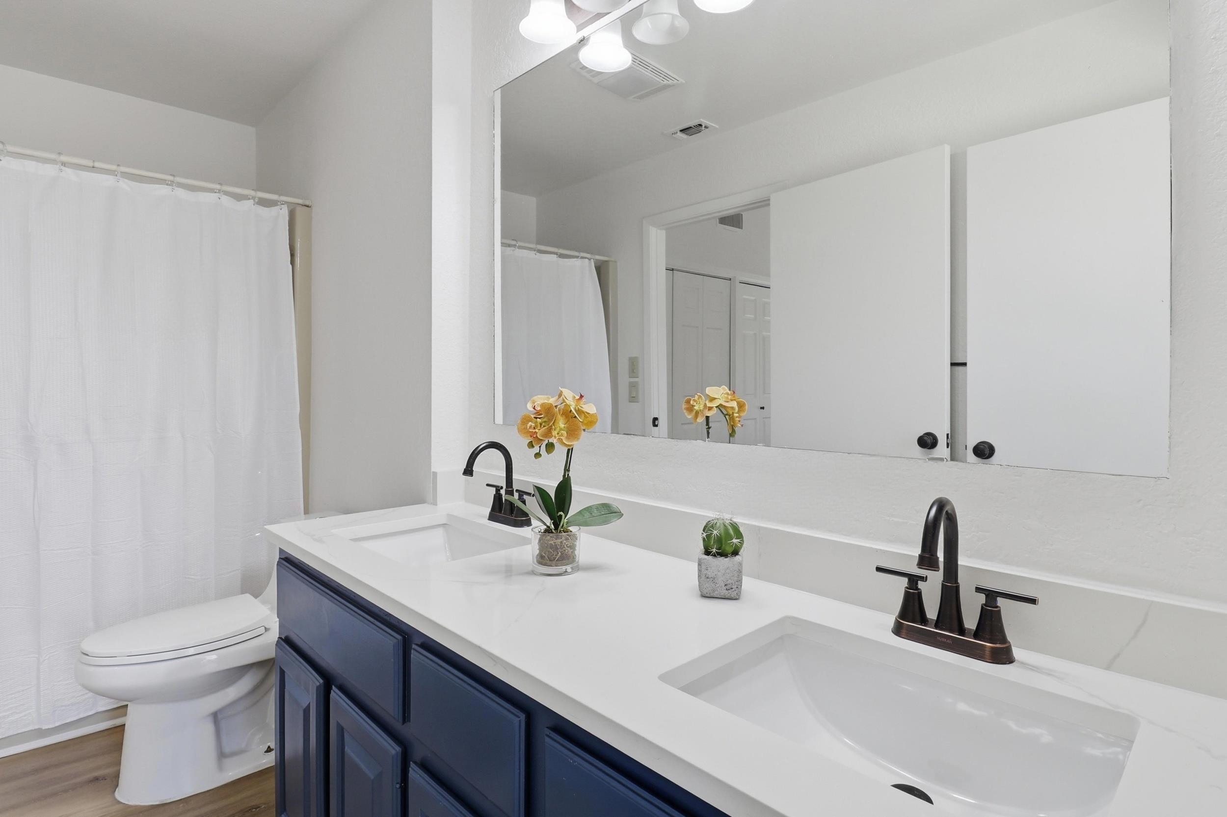 100 Bay Point Drive, Unit 3 Horseshoe Bay, TX 78657 - Photo 14 of 26 a bathroom with a sink and a toilet