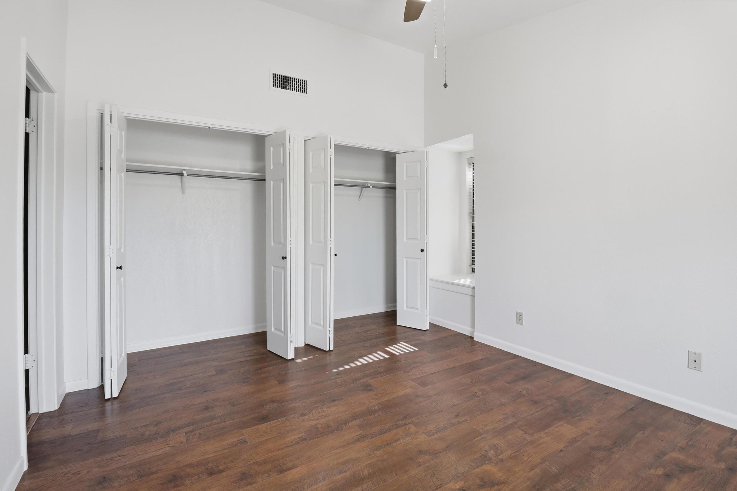 100 Bay Point Drive, Unit 3 Horseshoe Bay, TX 78657 - Photo 16 of 26 a view of an empty room with wooden floor
