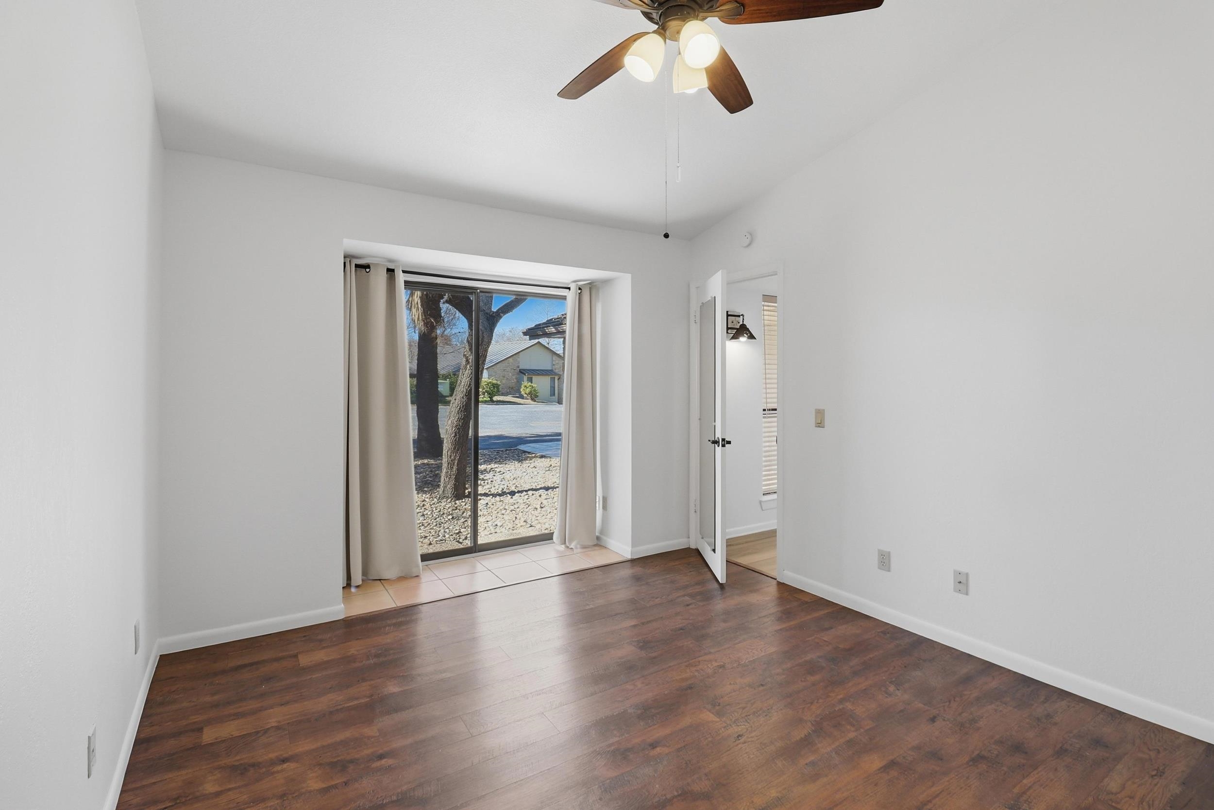 100 Bay Point Drive, Unit 3 Horseshoe Bay, TX 78657 - Photo 19 of 26 a view of an empty room with a window