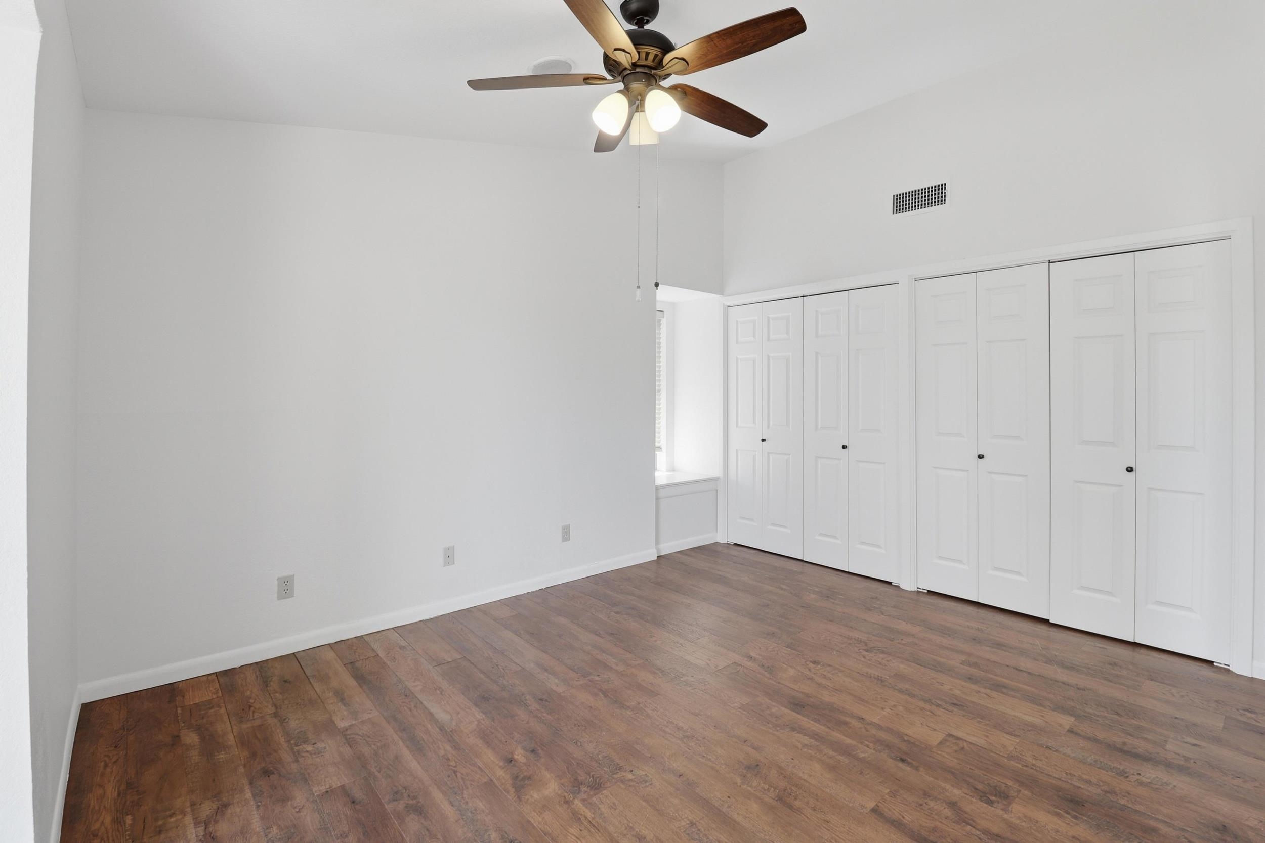 100 Bay Point Drive, Unit 3 Horseshoe Bay, TX 78657 - Photo 10 of 26 a view of an empty room with wooden floor