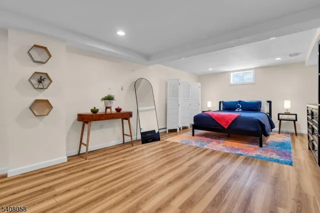 a bed room with a bed and a window