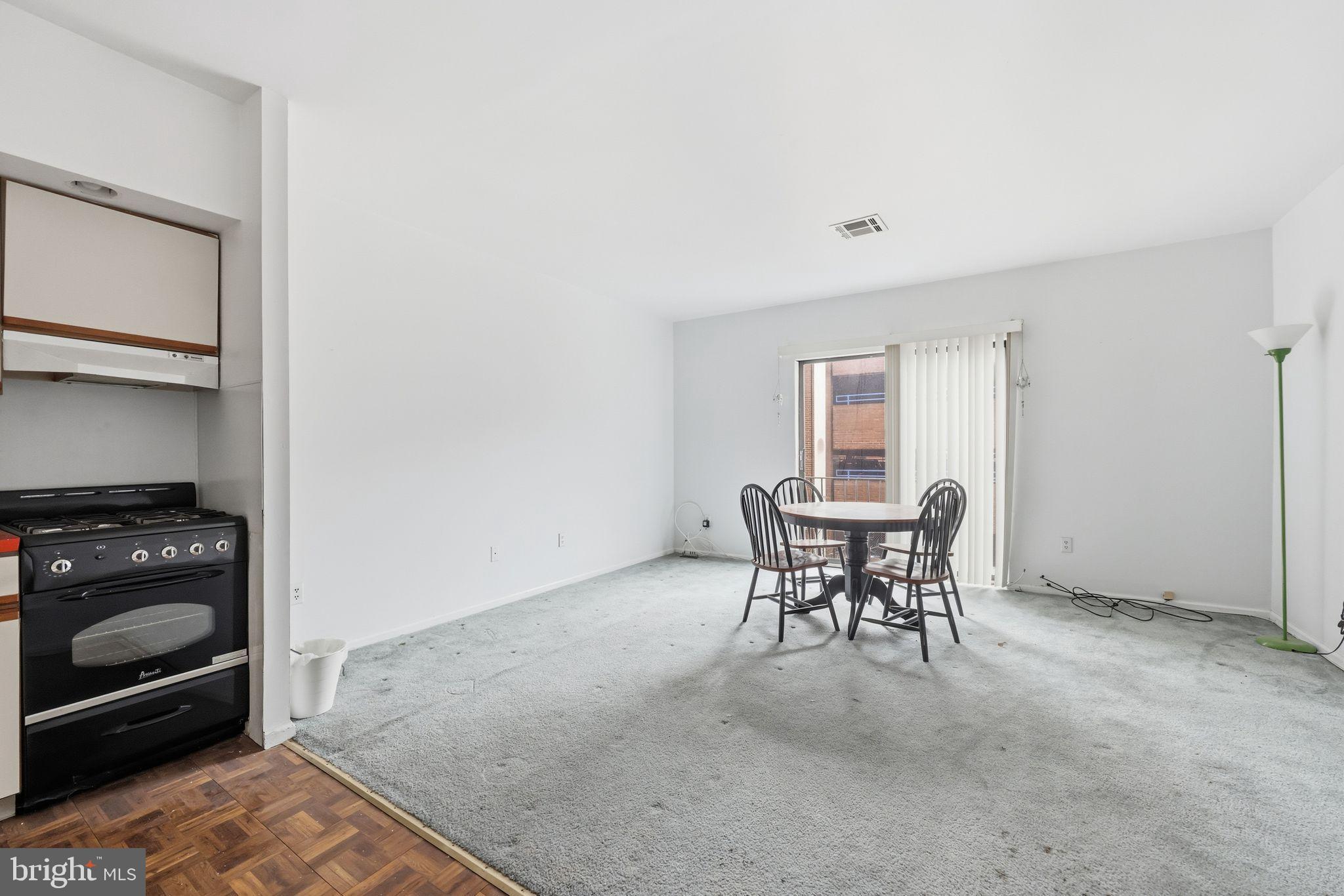 1713 South Street Philadelphia, PA 19146 - Photo 12 of 35 a dining room with furniture and window