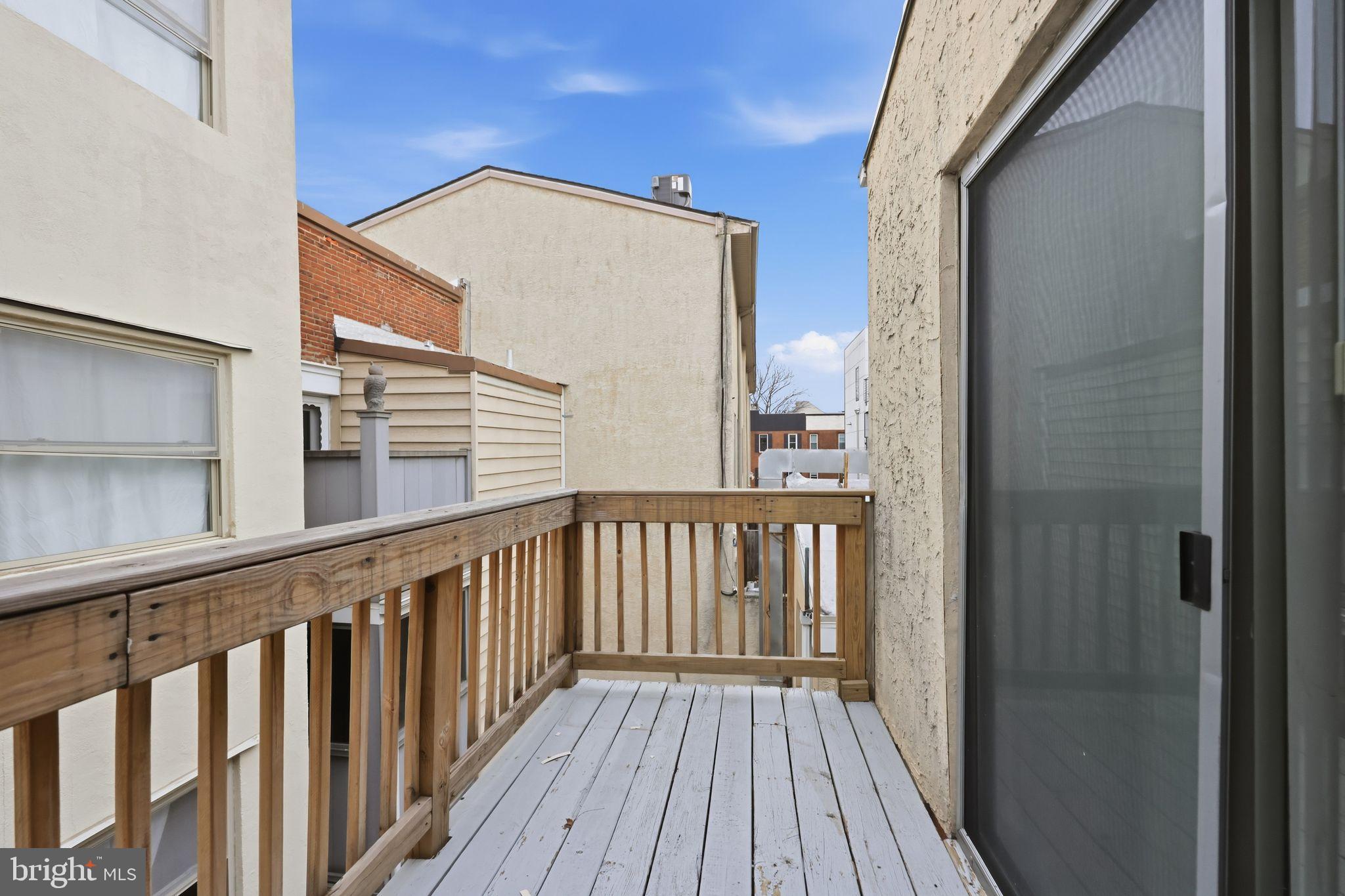 1713 South Street Philadelphia, PA 19146 - Photo 19 of 35 a view of a balcony with wooden floor