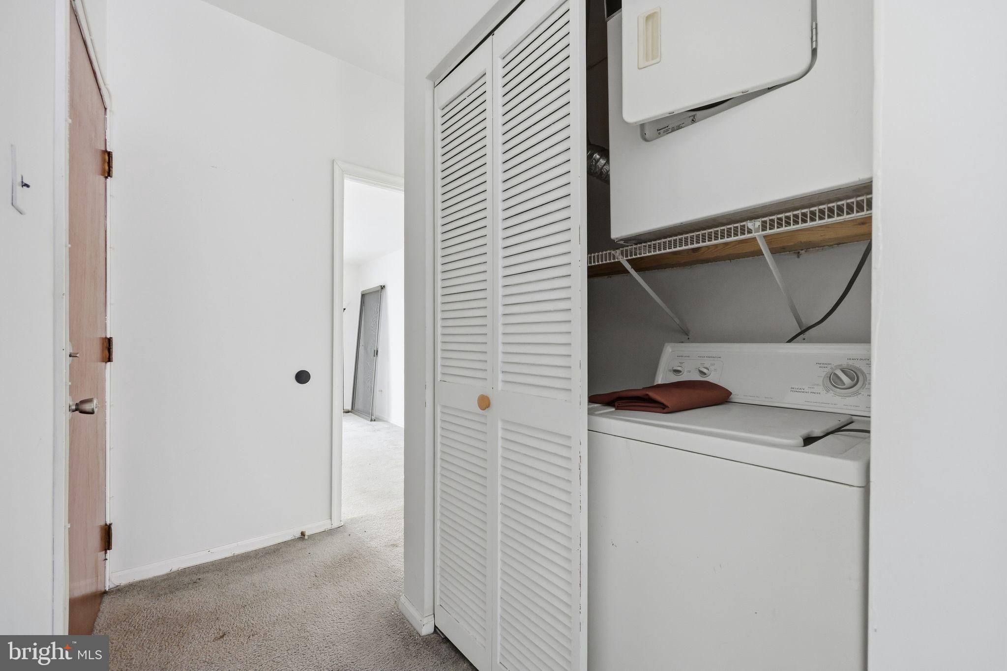 1713 South Street Philadelphia, PA 19146 - Photo 2 of 35 a utility room with dryer and washer