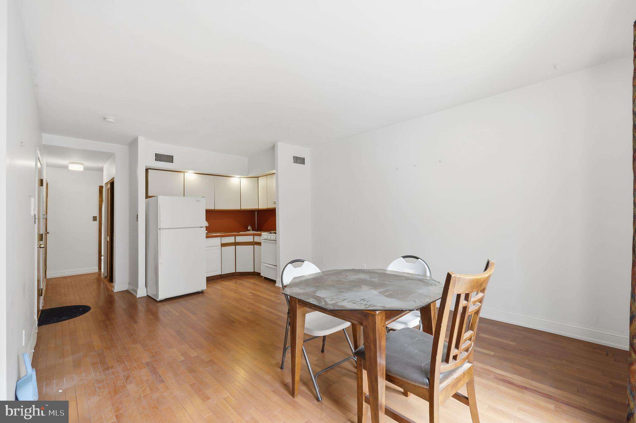 1713 South Street Philadelphia, PA 19146 - Photo 28 of 35 a view of a dining room with furniture and wooden floor