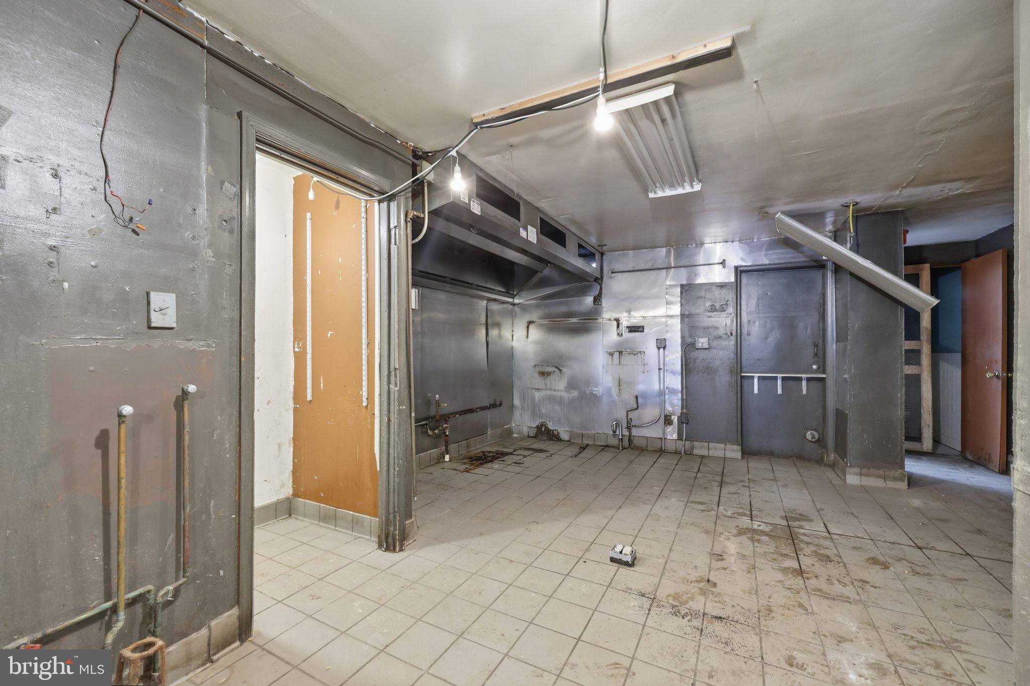 1713 South Street Philadelphia, PA 19146 - Photo 3 of 35 a view of a hallway with wooden walls