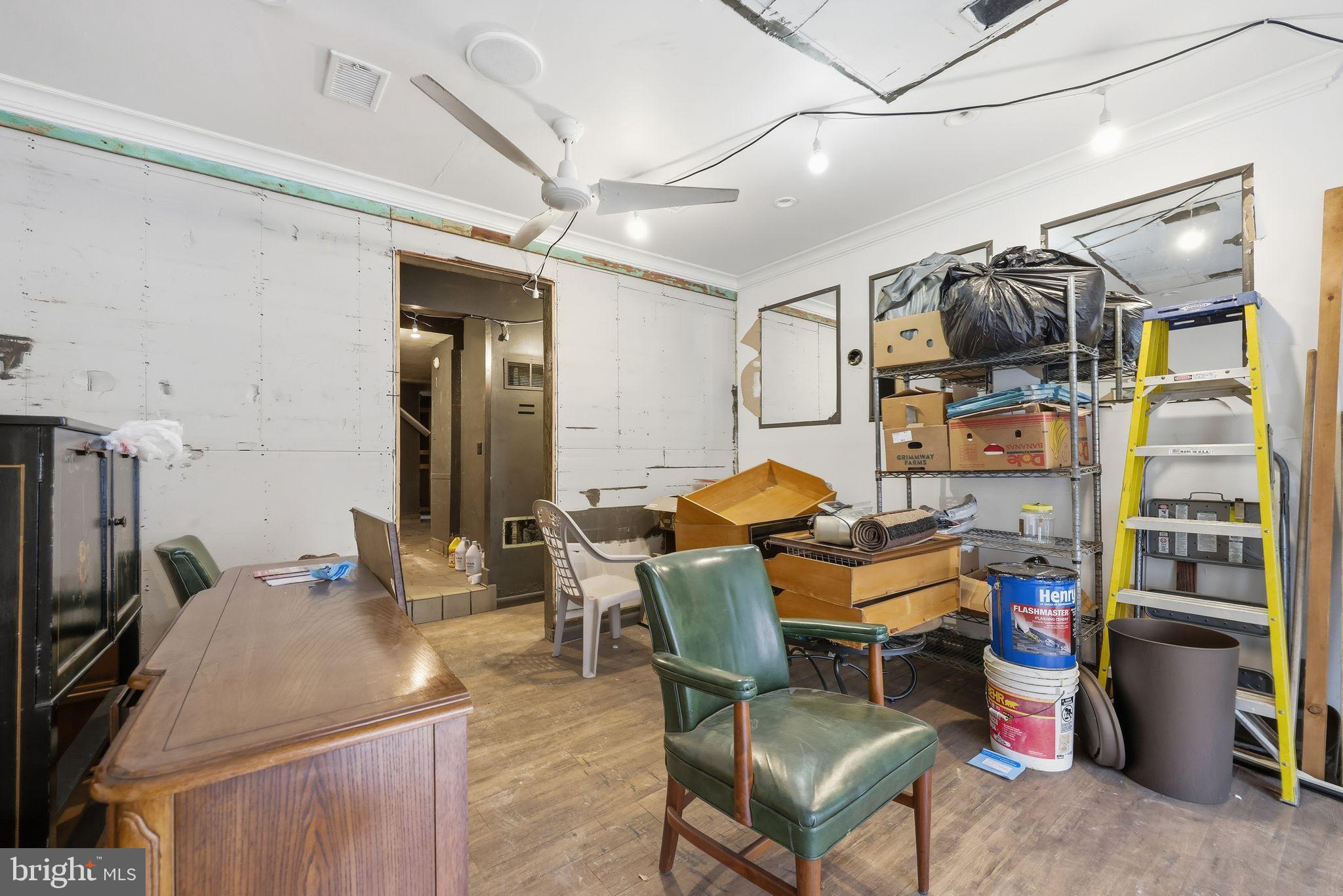 1713 South Street Philadelphia, PA 19146 - Photo 7 of 35 a room with furniture and a kitchen view