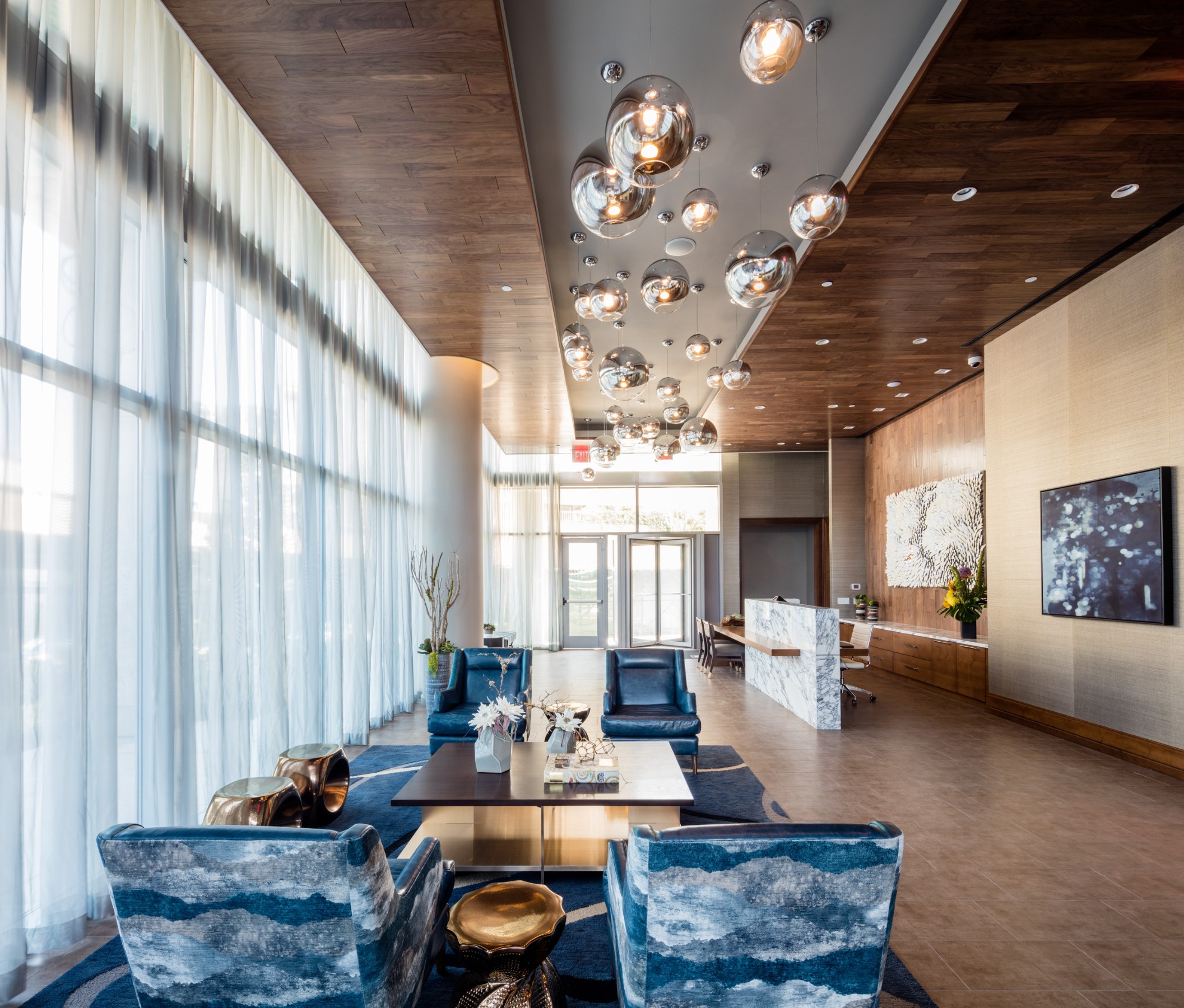 1524 Sheepshead Bay Road, Unit 17D Brooklyn, NY 11235 - Photo 19 of 24 a living room with fireplace furniture and a large window