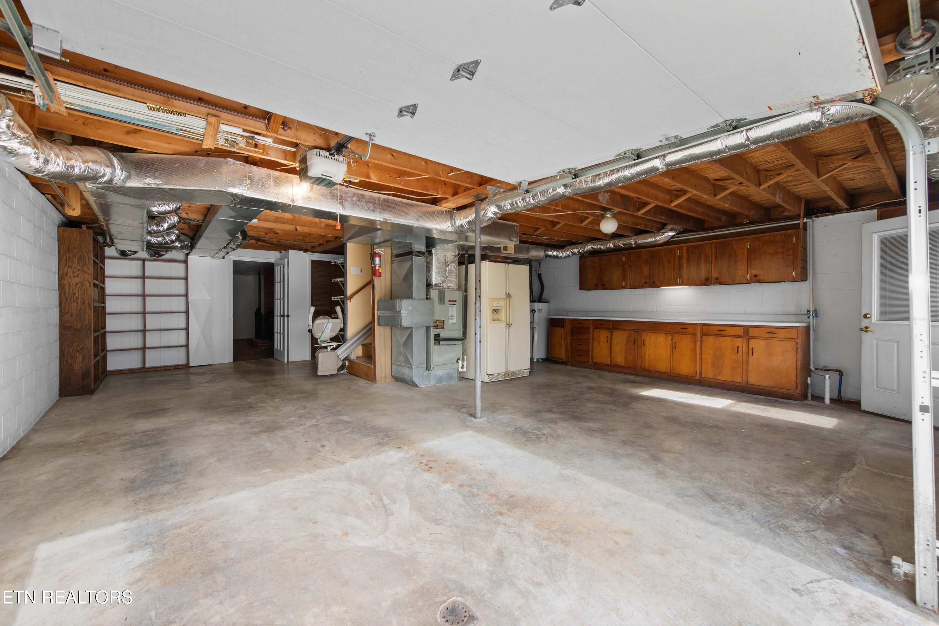 395 Wolfe Road Luttrell, TN 37779 - Photo 33 of 59 BASEMENT PARKING/KITCHEN