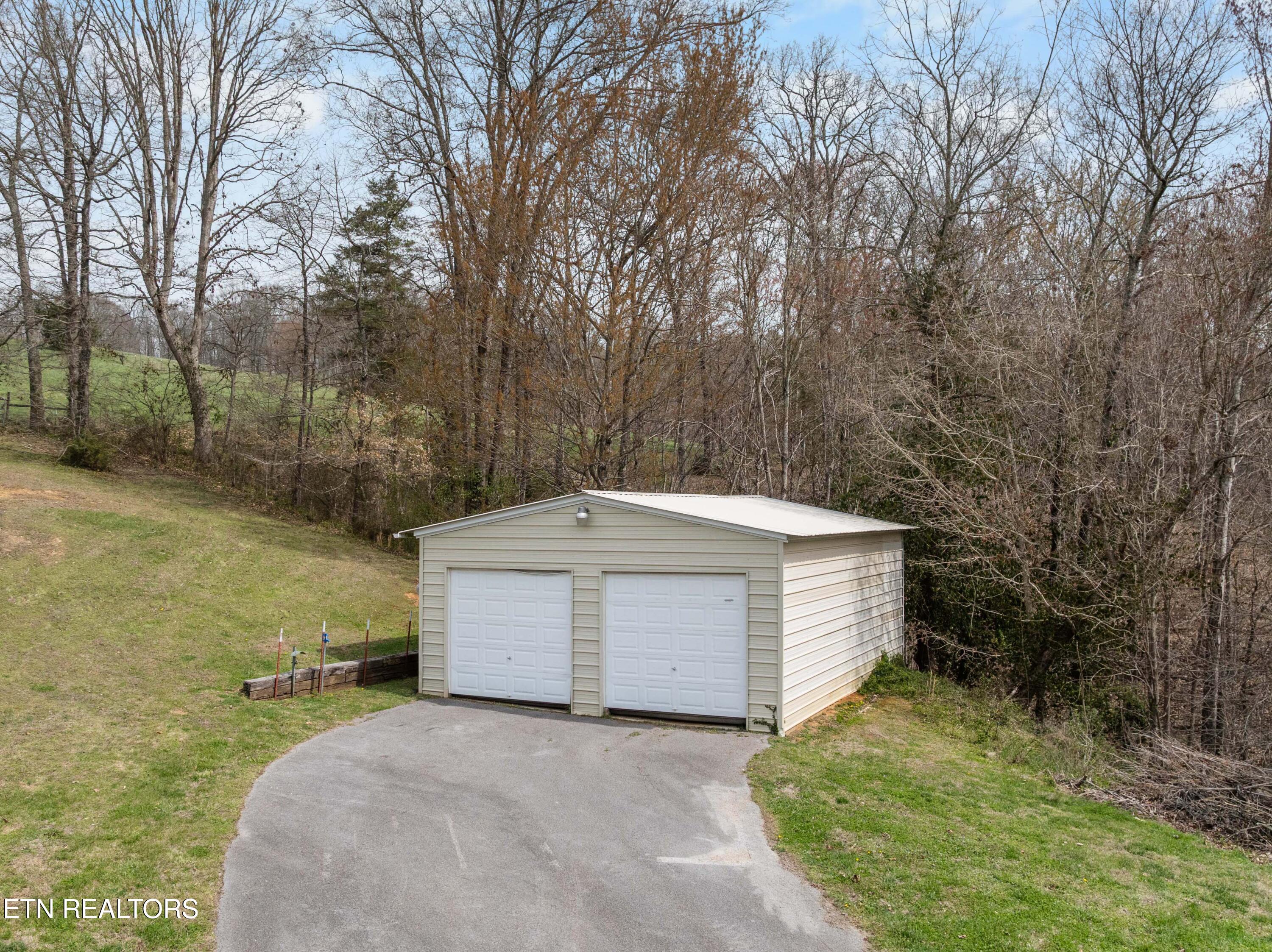 395 Wolfe Road Luttrell, TN 37779 - Photo 55 of 59 2 CAR METAL GARAGE