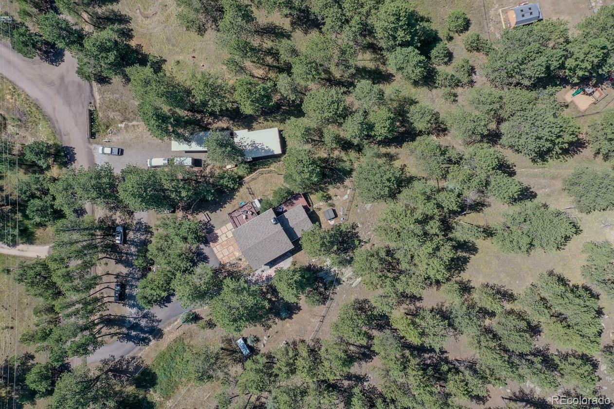 425 Patty Drive Evergreen, CO 80439 - Photo 37 of 43 an aerial view of a house with a yard