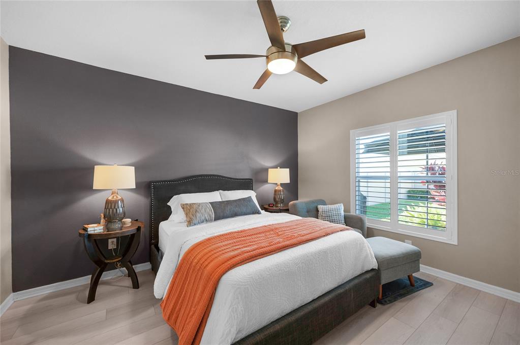 6236 Springmont Loop Palmetto, FL 34221 - Photo 16 of 55 a bedroom with bed and a window