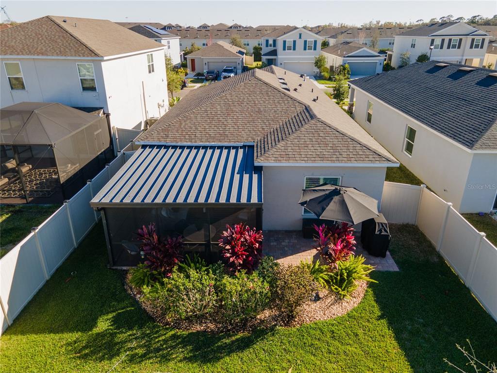 6236 Springmont Loop Palmetto, FL 34221 - Photo 34 of 55 a view of a house with a yard and sitting area