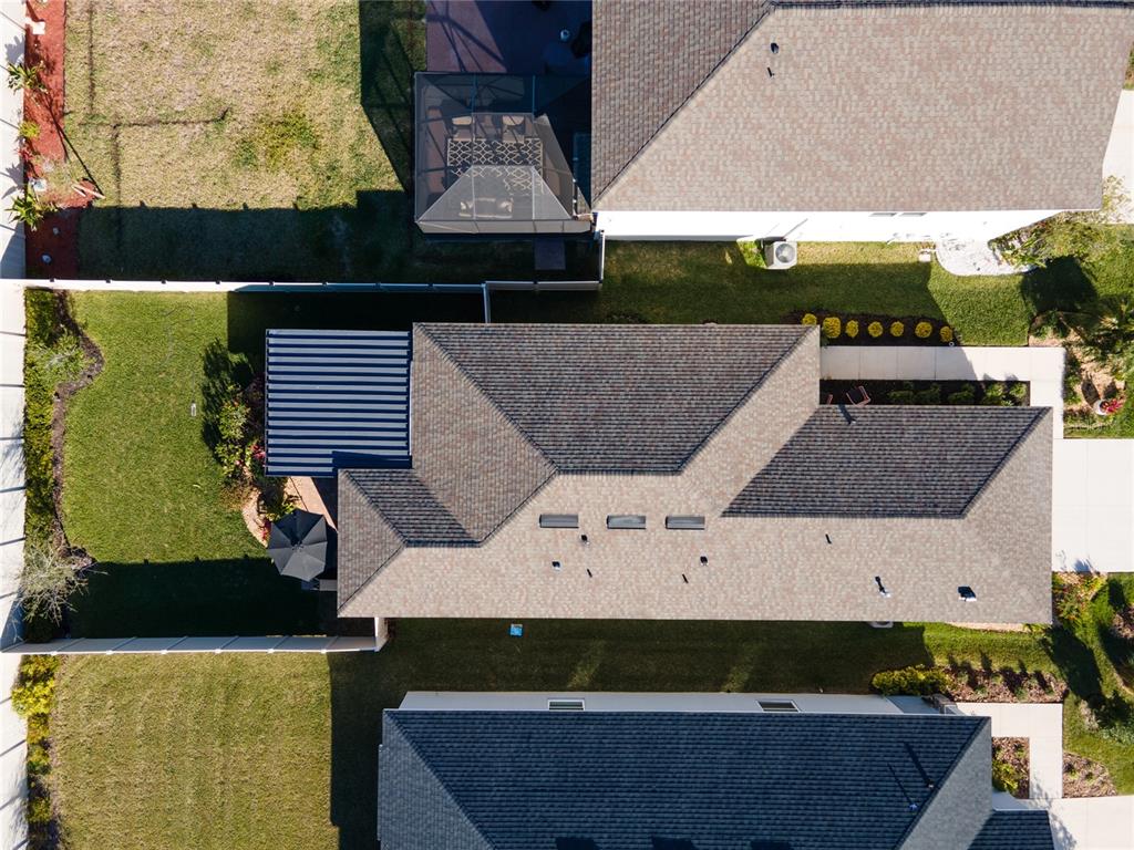 6236 Springmont Loop Palmetto, FL 34221 - Photo 42 of 55 an aerial view of a house with a yard