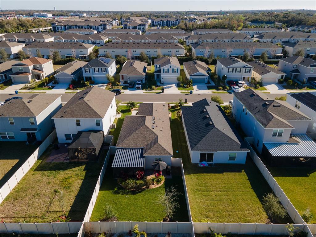 6236 Springmont Loop Palmetto, FL 34221 - Photo 43 of 55 an aerial view of a house with a swimming pool