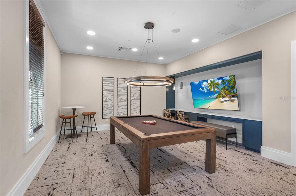 6236 Springmont Loop Palmetto, FL 34221 - Photo 45 of 55 a room with furniture pool table and windows