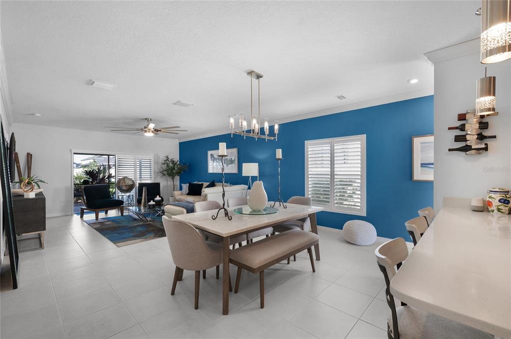 6236 Springmont Loop Palmetto, FL 34221 - Photo 10 of 55 a living room with furniture chess table and a window