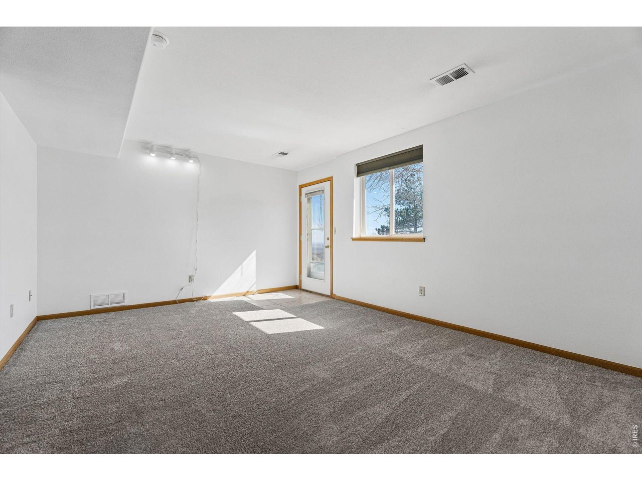 6344 Stag Hollow Road Fort Collins, CO 80526 - Photo 28 of 49 a view of an empty room with window
