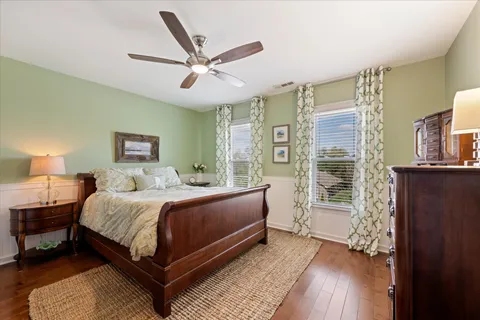 a bed room with a bed and a window