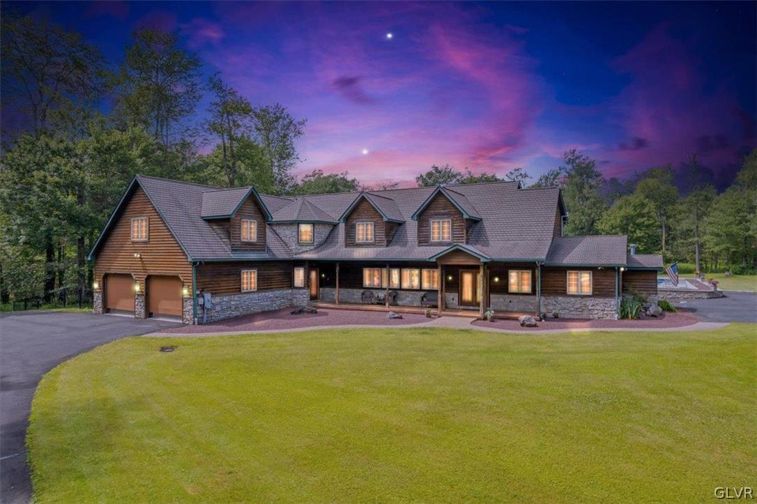 a view of a house with a big yard