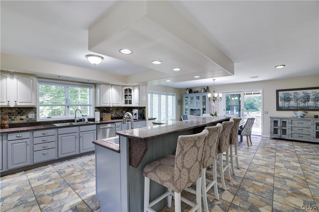 2285 Green Road Tobyhanna, PA 18466 - Photo 11 of 42 a kitchen with lots of counter top space and dining table