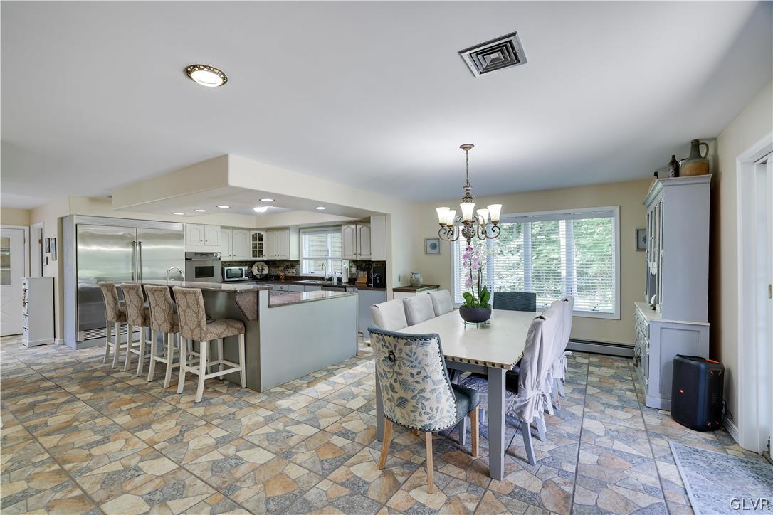 2285 Green Road Tobyhanna, PA 18466 - Photo 14 of 42 a view of a dining room with furniture window and outside view