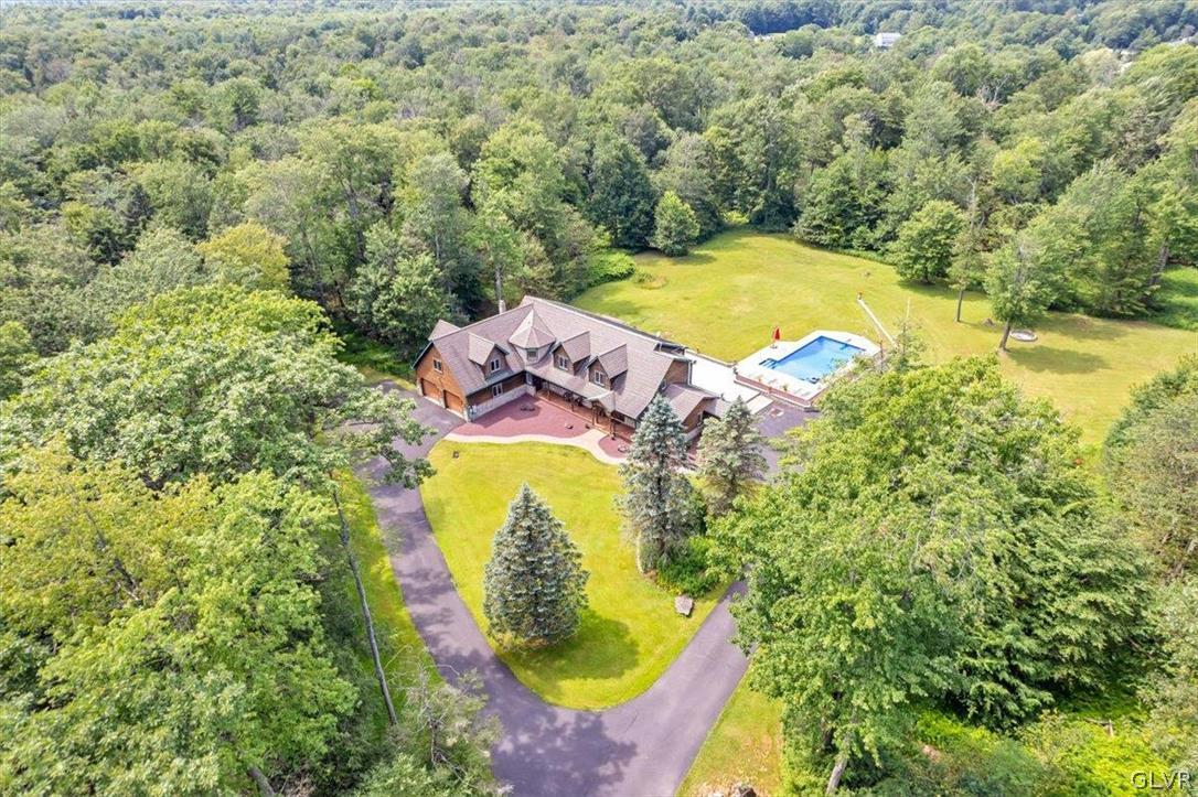 2285 Green Road Tobyhanna, PA 18466 - Photo 2 of 42 a view of a swimming pool with a yard