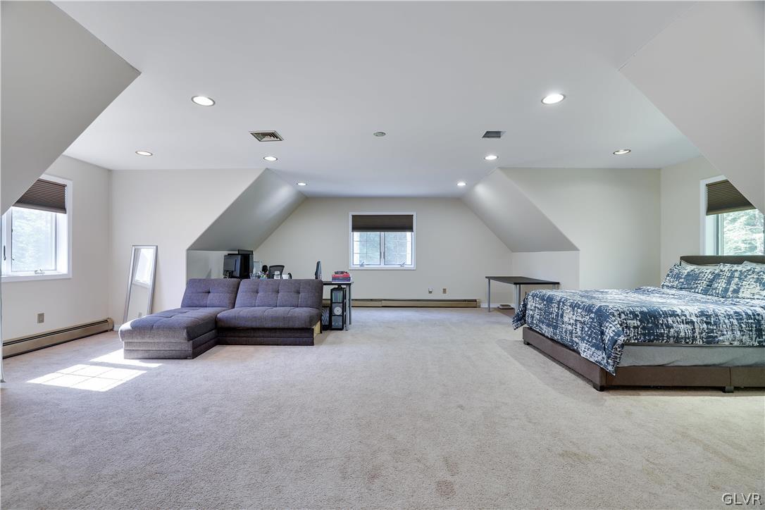 2285 Green Road Tobyhanna, PA 18466 - Photo 29 of 42 a living room with furniture and a chandelier