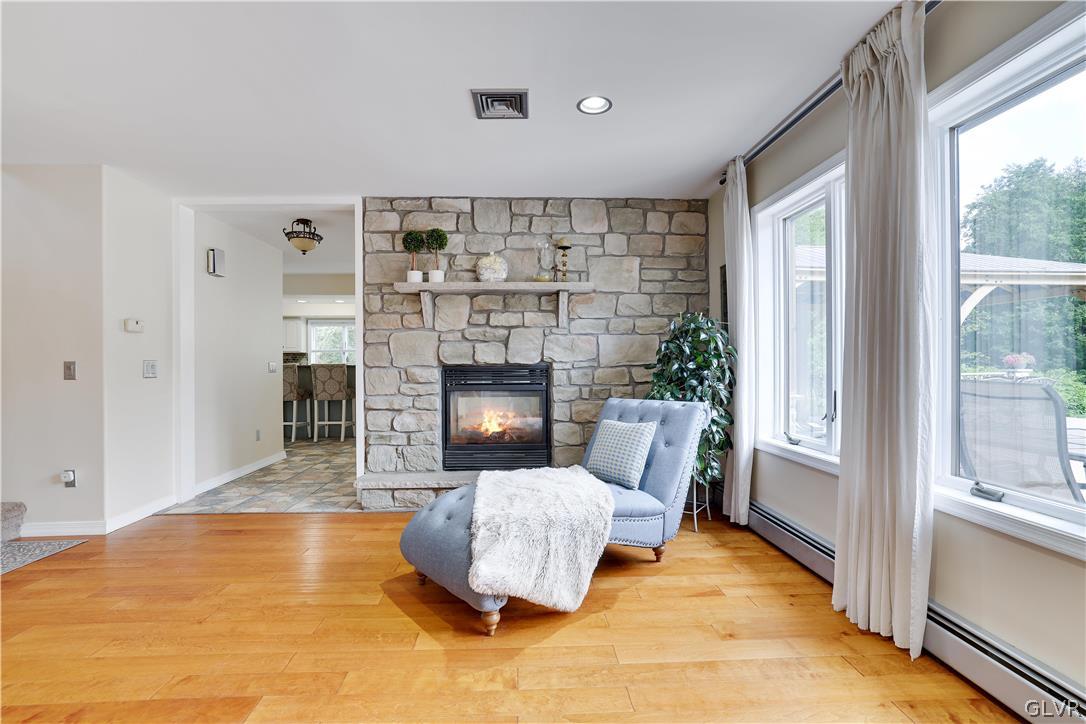 2285 Green Road Tobyhanna, PA 18466 - Photo 6 of 42 a living room with furniture and a fireplace