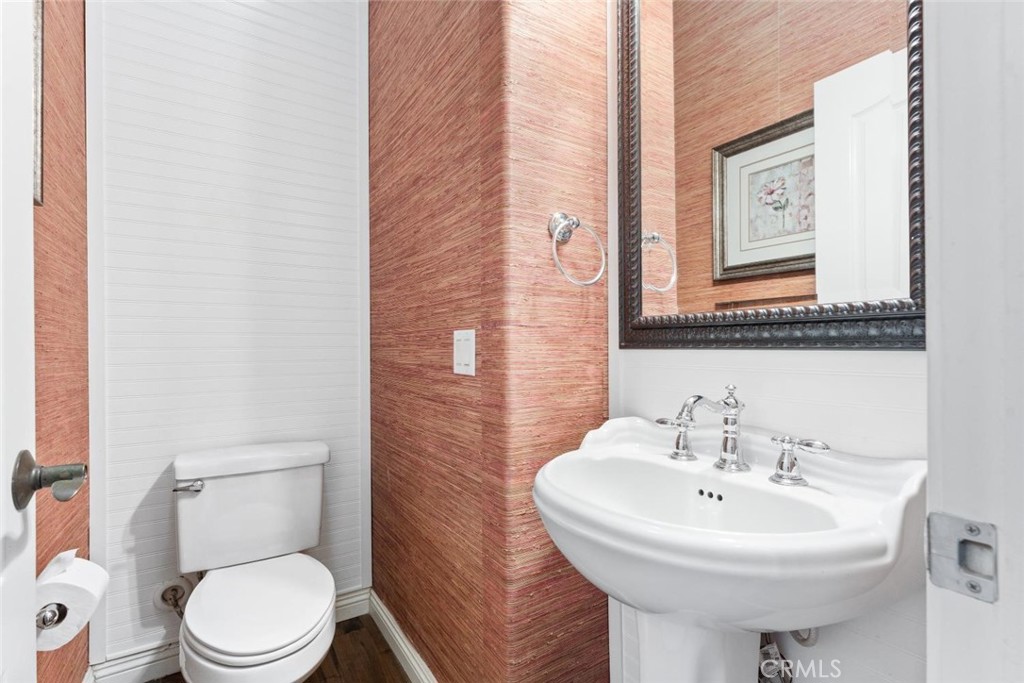 22 Arlington Street Ladera Ranch, CA 92694 - Photo 17 of 51 a bathroom with a sink mirror and toilet