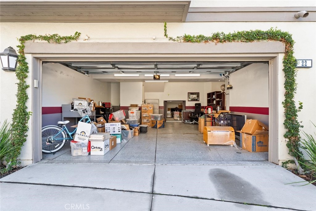 22 Arlington Street Ladera Ranch, CA 92694 - Photo 39 of 51 a view of a storage room with a table and a couch