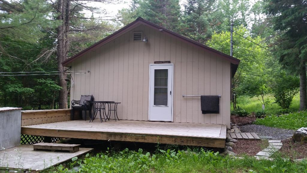 75 Campground Road North Anson, ME 04958 - Photo 1 of 31 Front of the camp. Nice newer deck!