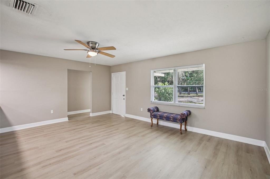 204 East Shell Point Road Ruskin, FL 33570 - Photo 13 of 48 an empty room with a window and a ceiling fan