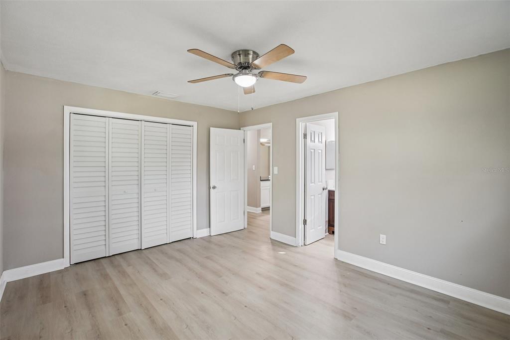204 East Shell Point Road Ruskin, FL 33570 - Photo 22 of 48 a view of an empty room with wooden floor