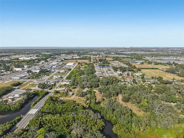 an aerial view of residential building and ocean