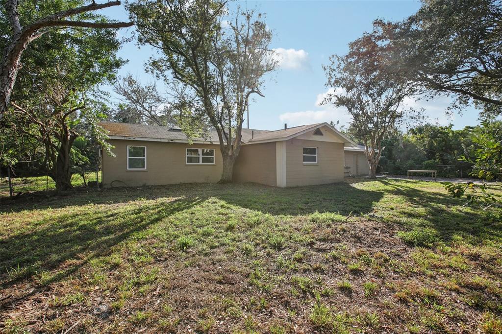 204 East Shell Point Road Ruskin, FL 33570 - Photo 39 of 48 a house view with a backyard space