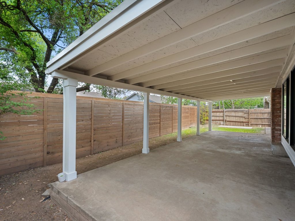 6902 Meadow Run Austin, TX 78745 - Photo 29 of 33 a view of outdoor room with wooden walls