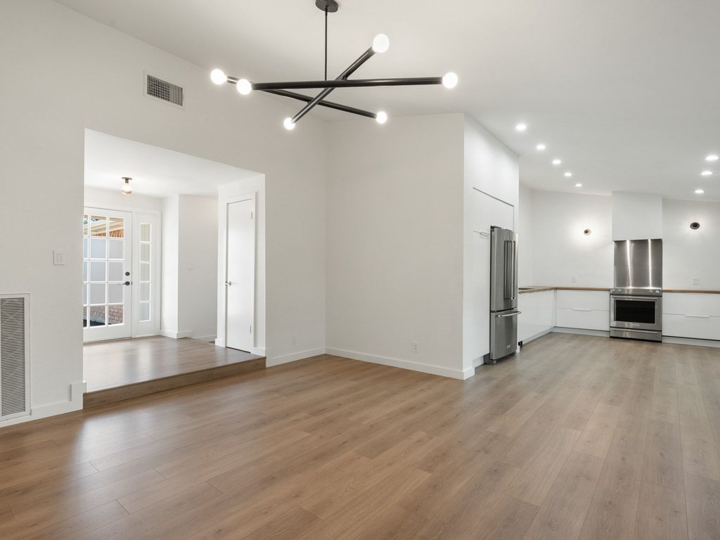 6902 Meadow Run Austin, TX 78745 - Photo 8 of 33 a view of a livingroom with a staircase