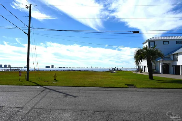a view of balcony and yard