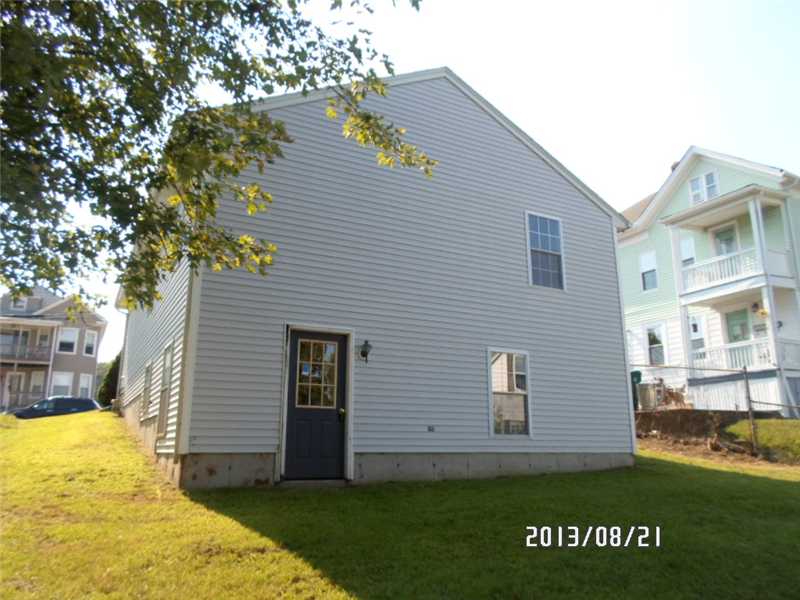 59 7th Avenue Woonsocket, RI 02895 - Photo 2 of 13 Exterior Back.